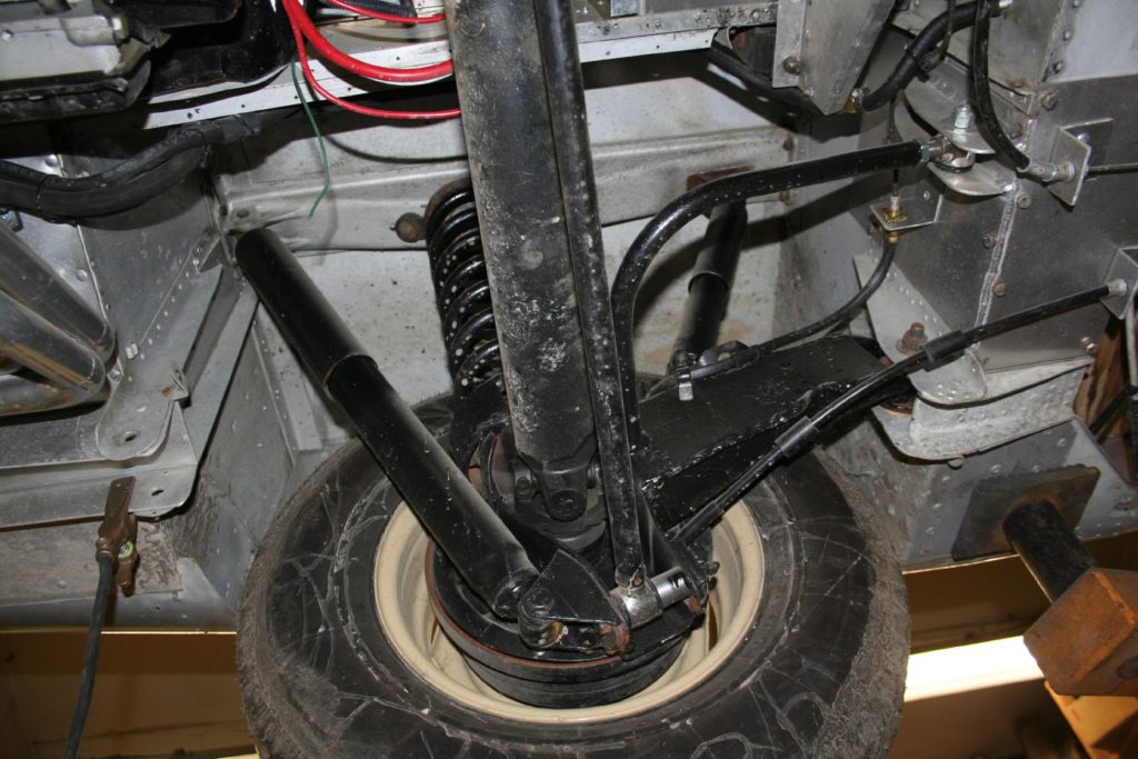 Modified left rear suspension