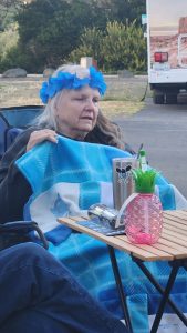 Crowned with a blue lei